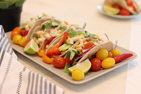 Tacos with guacamole and corn salad